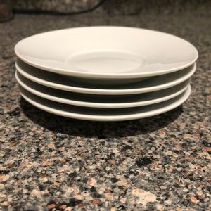 Set of 4 white saucers